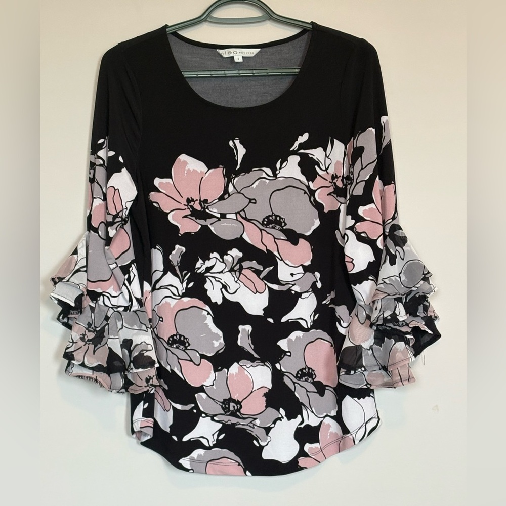 Cleo size SP black with floral pattern.